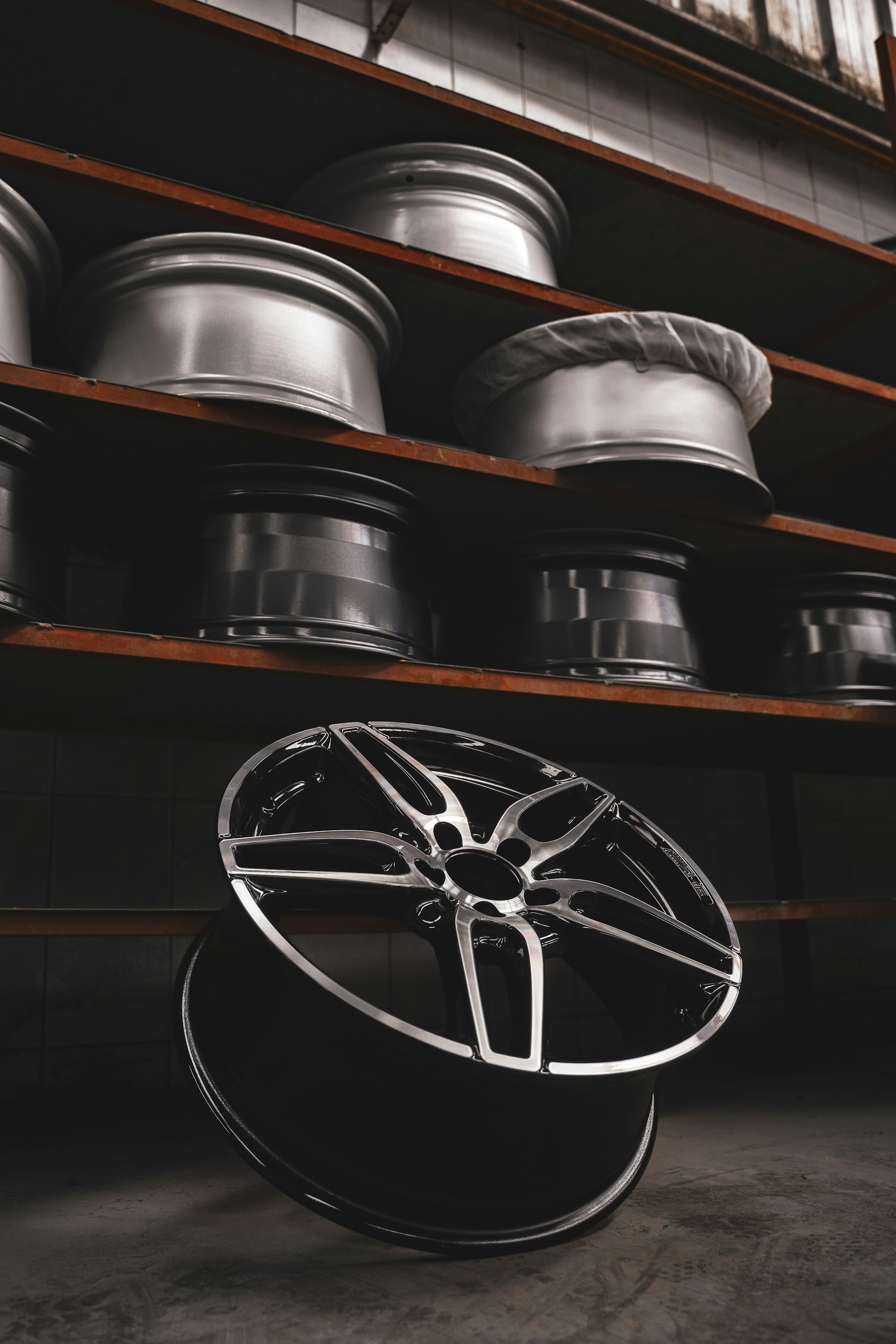 close up of rims on shelf